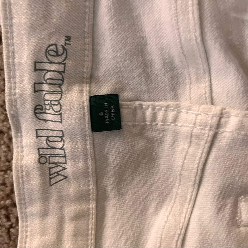 White ripped jeans